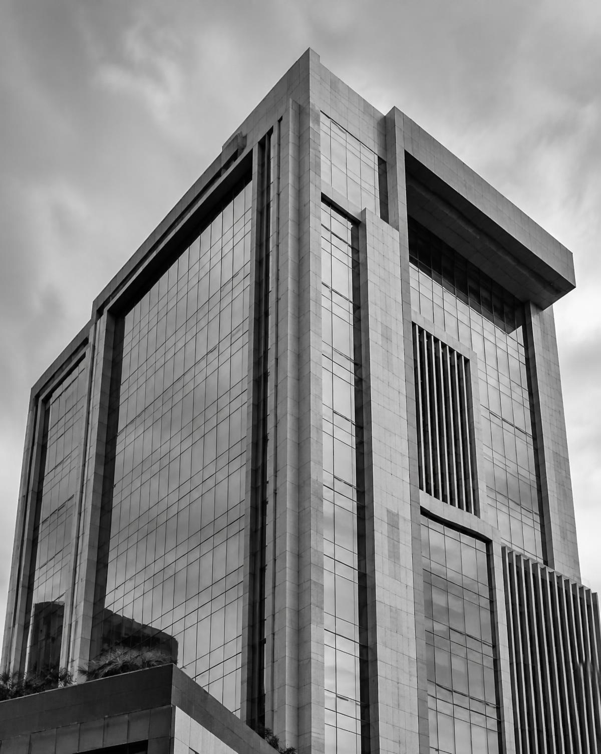 Modern commercial tower facade photographed from a low angle